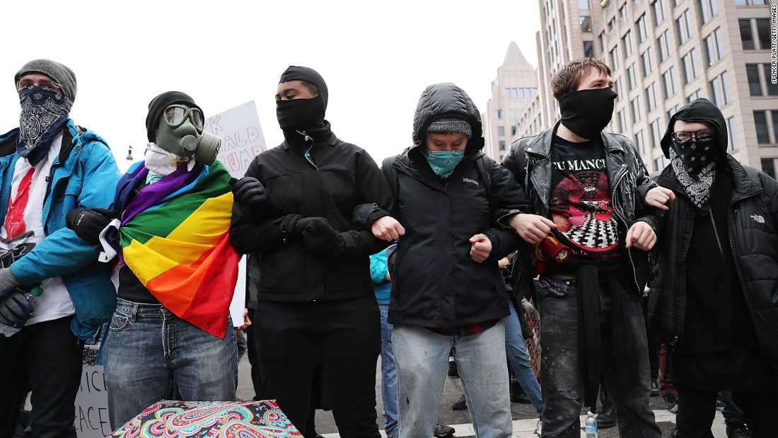 Police and demonstrators clash in downtown Washington, on January 20, 2017, following the inauguration of President Donald Trump.