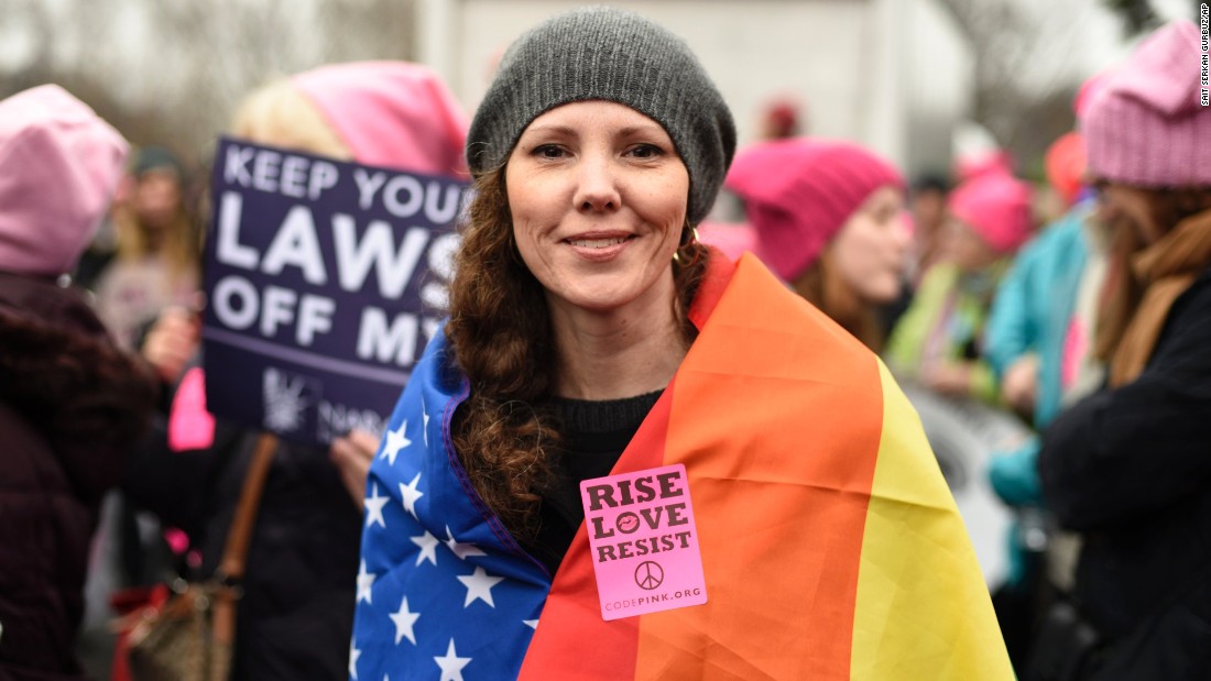 New Yorker Nicole Monceaux joins in the march.