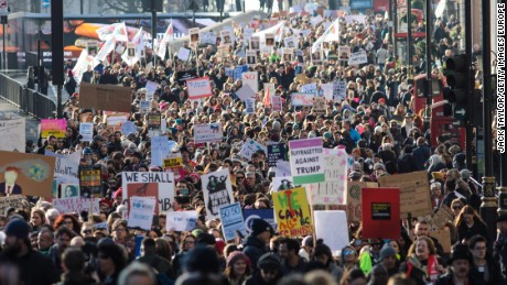 LONDON, ENGLAND - JANUARY 21: Protesters march from The US Embassy in Grosvenor Square towards Trafalgar Square during the Women&#39;s March on January 21, 2017 in London, England. The WomenÕs March originated in Washington DC but soon spread to be a global march calling on all concerned citizens to stand up for equality, diversity and inclusion and for womenÕs rights to be recognised around the world as human rights. Global marches are now being held, on the same day, across seven continents. (Photo by Jack Taylor/Getty Images)
