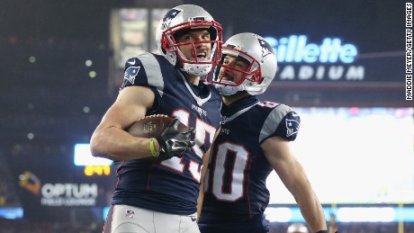 Hogan celebrating with Danny Amendola after scoring against the Pittsburgh Steelers in the AFC Championship Game.