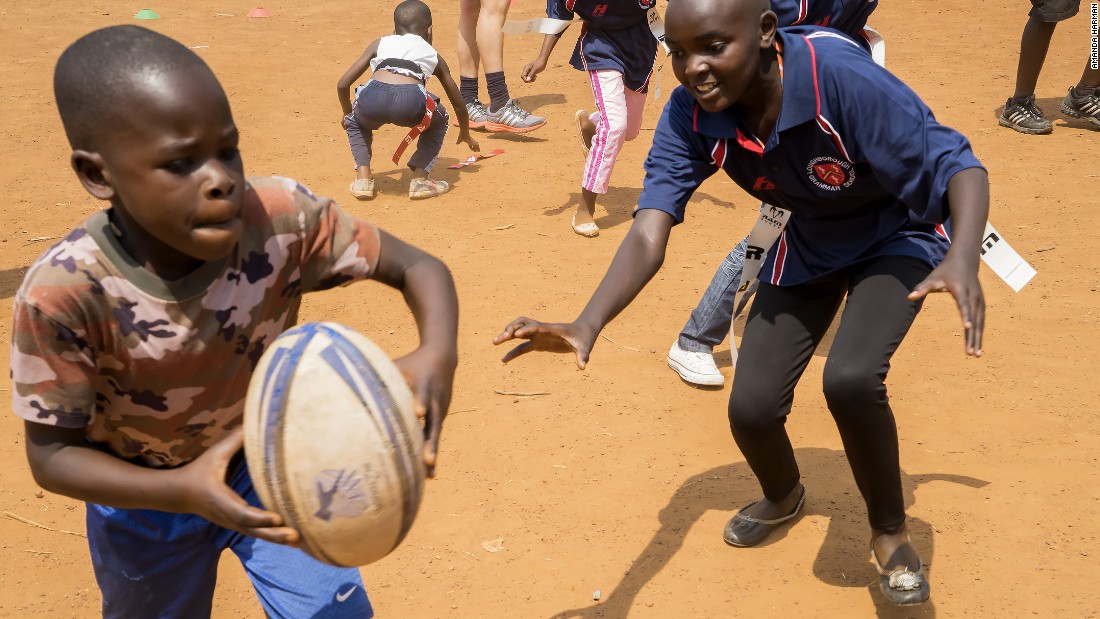 It was introduced by volunteer worker Emma Rees, who was traveling with a rugby ball.