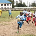 rwanda rugby child running