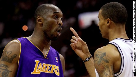 LA Lakers star Kobe Bryant (left) clashes with San Antonio&#39;s George Hill in 2010.