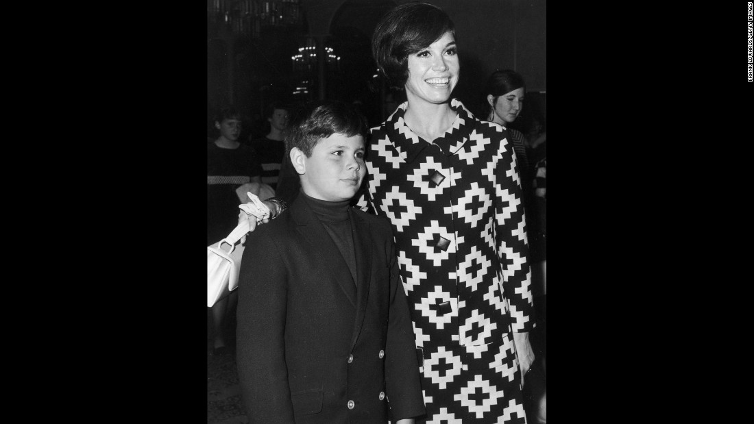 Moore puts her arm around her son, Richard, at a Teach Foundation benefit in 1968. Richard, Moore&#39;s only child, died in 1980 after he accidentally shot himself while handling a shotgun.