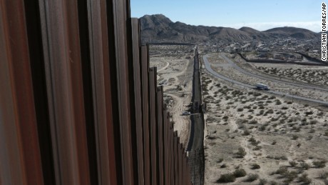A truck drives near the Mexico-US border fence, on the Mexican side, separating the towns of Anapra, Mexico and Sunland Park, New Mexico, Wednesday, Jan. 25, 2017.  U.S. President Donald Trump will direct the Homeland Security Department to start building a wall at the Mexican border. (AP Photo/Christian Torres)