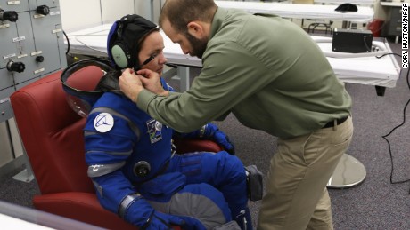 Boeing unveils new, blue spacesuits