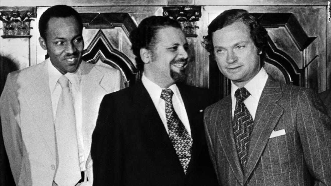 Before he was Nigeria&#39;s President, Buhari was an officer in the country&#39;s army. Here, he stands next to Saudi Sheikh Ahmed Zaki Yamani, center, and Swedish King Carl Gustaf during an OPEC summit in Stockholm, Sweden, in 1977.