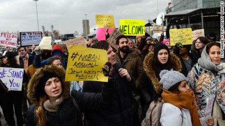 Protesters mass at airports to decry Trump's immigration policies