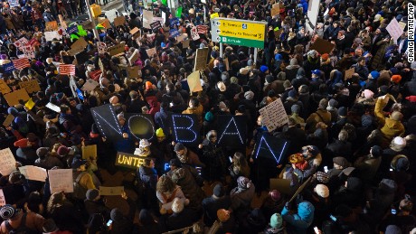 Protesters assemble at John F. Kennedy International Airport in New York, Saturday, Jan. 28, 2017, after earlier in the day two Iraqi refugees were detained while trying to enter the country. On Friday, Jan. 27, President Donald Trump signed an executive order suspending all immigration from countries with terrorism concerns for 90 days. Countries included in the ban are Iraq, Syria, Iran, Sudan, Libya, Somalia and Yemen, which are all Muslim-majority nations. (AP Photo/Craig Ruttle)
