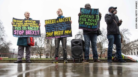 Protestors demonstrate against Brexit in Parliament Square.