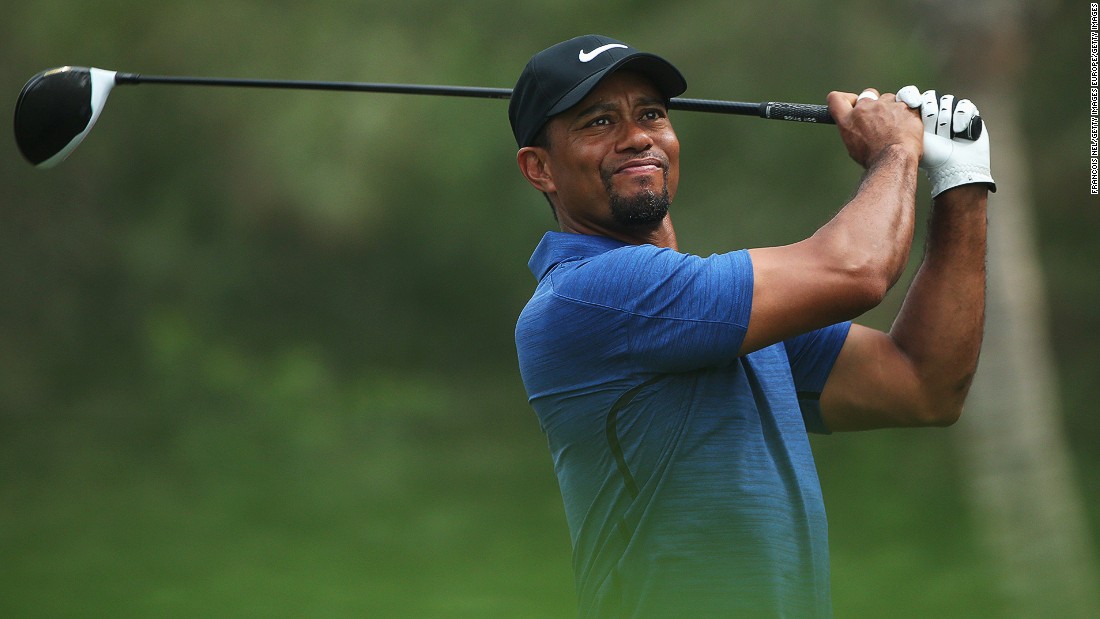 A &quot;back spasm&quot; has forced Tiger Woods to withdraw from the Dubai Desert Classic.  