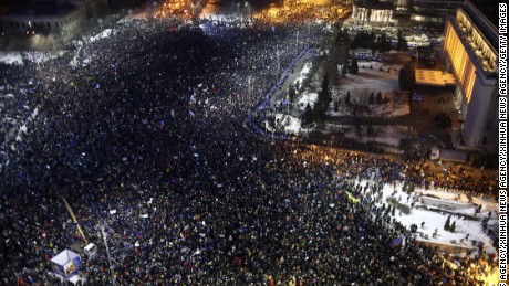 Scores of people demonstrating against corruption reforms in Bucharest on Thursday.