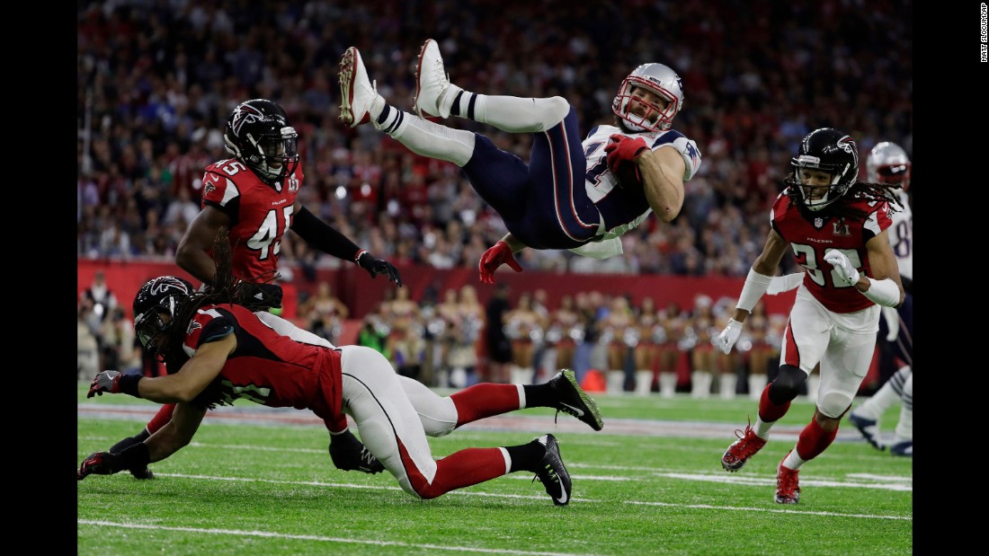 Edelman is upended by Atlanta&#39;s Philip Wheeler in the first quarter.