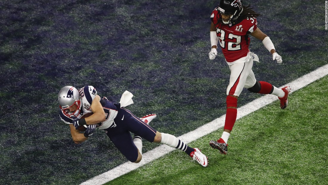 Danny Amendola catches a 6-yard touchdown pass for New England in the fourth quarter. After a two-point conversion, the Patriots cut the Falcons&#39; lead to 28-20 with just under six minutes remaining.