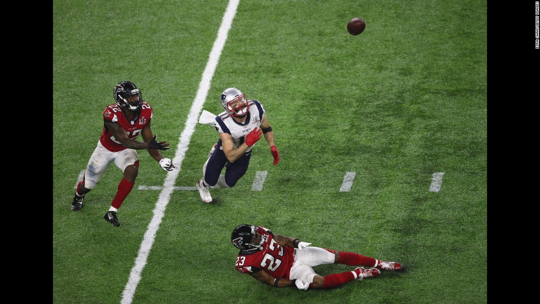 New England wide receiver Julian Edelman, center, made a spectacular catch late in the fourth quarter of &lt;a href=&quot;http://www.cnn.com/2017/02/05/sport/gallery/super-bowl-li/index.html&quot; target=&quot;_blank&quot;&gt;Super Bowl LI,&lt;/a&gt; and it might become one of the game&#39;s most replayed highlights.