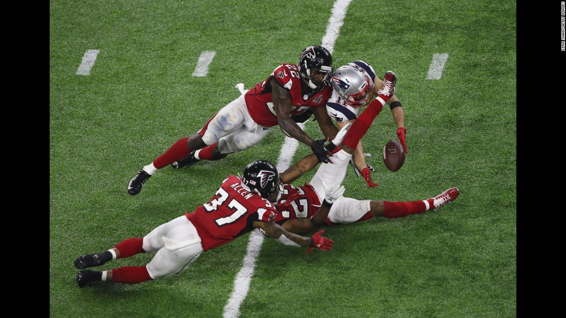 As he fell to the ground, Edelman appeared to cradle the ball near Alford&#39;s left leg.