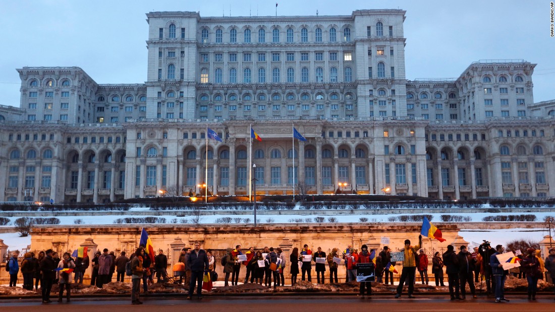 Protesters gather in front of a government building on Saturday, February 4. In a nationally televised address Saturday evening, Prime Minister Grindeanu told Romanians, &quot;Romania cannot be torn apart.&quot;