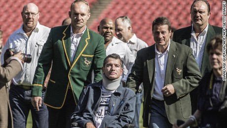 Van der Westhuizen (C), during a re-enactment of the team photo from the 1995 Rugby World Cup final.