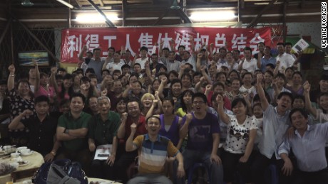 Strikers and Panyu Workers Center activists celebrate in late 2015. 