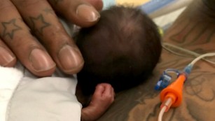 NBA star holds premature baby for first time