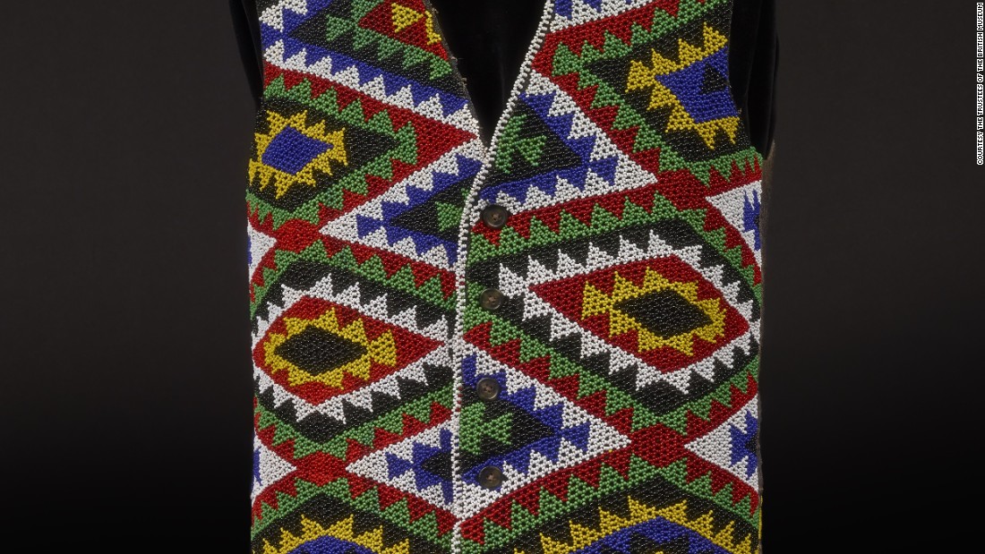 This Zulu beaded waistcoat, is made of glass and wool, and is thought to have been created before 1987 in South Africa. 