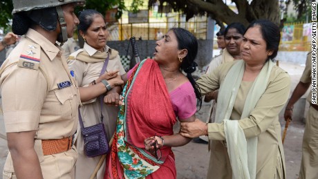 A member of the Dalit caste community is detained during a protest against an earlier attack on Dalits in July, 2016.