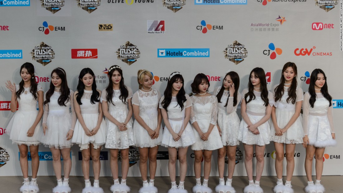 Members of I.O.I pose on the red carpet at the Mnet Asian Music Awards (MAMA) at Asia-World Expo in Hong Kong on December 2, 2016. They  disbanded on January 31, 2017.