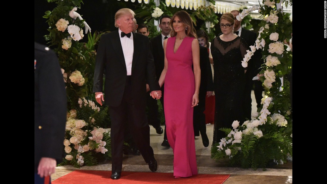 The Trumps arrive for a Red Cross gala at their Mar-a-Lago estate in February 2017.