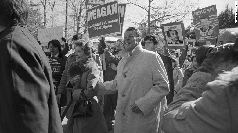 In this Feb. 26, 1980, file photo, Republican presidential hopeful Ronald Reagan and wife Nancy do some last-minute campaigning in Manchester for New Hampshire&#39;s presidential primary.