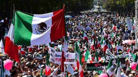 Thousands of Mexicans take part in an anti-Trump march in Mexico City, on February 12, 2017.
Mexicans took to the streets against US President Donald Trump, hitting back at his anti-Mexican rhetoric and vows to make the country pay for his "big, beautiful" border wall. / AFP / RONALDO SCHEMIDT        (Photo credit should read RONALDO SCHEMIDT/AFP/Getty Images)