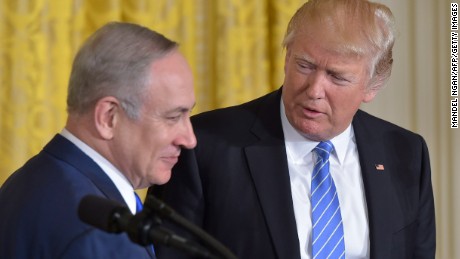 US President Donald Trump(R) welcomes Israeli Prime Minister Benjamin Netanyahu during a joint press conference at the White House in Washington, DC, February 15, 2017. / AFP / MANDEL NGAN        (Photo credit should read MANDEL NGAN/AFP/Getty Images)