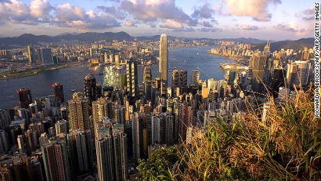 This general view from &quot;The Peak&quot; shows Hong Kong&#39;s latest addition to its skyline, the newly completed 88-storey Two IFC building (C), towering above the city, 12 July 2003. Two IFC, which is the third tallest building in the world behind the Sears Tower in Chicago and the Petronas Towers in Kuala Lumpur, is expected to open for business in a month.     AFP PHOTO/Richard A. BROOKS   (Photo credit should read RICHARD A. BROOKS/AFP/Getty Images)