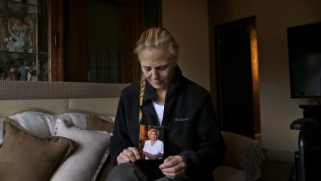 Bobbi Young holds a photo of her mother, Marilyn Young, the day after she passed away at home in Carmel Valley, Calif., on Monday, January 9, 2017. Marilyn Young contracted an STD after being raped at the age of 88 by an unknown assailant in a California nursing home. 