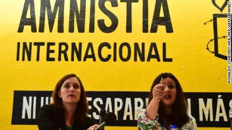 Erika Guevara-Rosas (R), director for the Americas of Amnesty International speaks next to Madeleine Penman researcher on Mexico for Amnesty International (L) during the presentation of the report  "Survive to the death" on torture to women in jails of Mexico, on June 28, 2016, in Mexico city. / AFP / RONALDO SCHEMIDT        (Photo credit should read RONALDO SCHEMIDT/AFP/Getty Images)