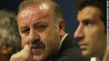 Then-Real Madrid head coach Vicente del Bosque (left) talks to the press as Luis Figo looks on during a press conference at Hampden Park, Glasgow in 2002.