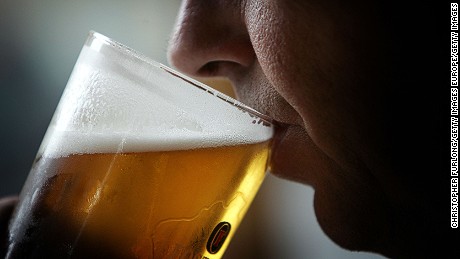 GLASGOW, SCOTLAND - NOVEMBER 26:  A man drinks a pint of beer on November 26, 2004 in Glasgow, Scotland. The Scottish Executive has announced a major campaign designed to call time on the binge drinking culture which creates bad health and anti social behaviour. It is estimated that drink related problems cost the people of Scotland over GBP1bn a year.  Glasgow City Council has already banned &quot;happy hours&quot; where cut price drinks can be bought at specific times. (Photo illustration by Chris Furlong/Getty Images)