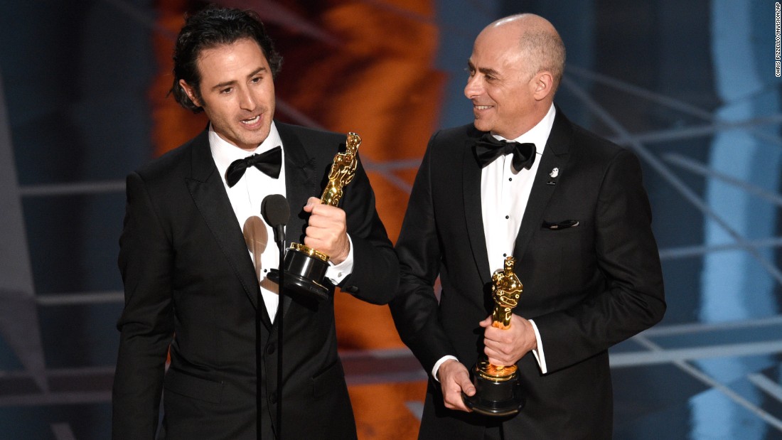 Alan Barillaro, left, and Marc Sondheimer accept the Oscar for best animated short film  (&quot;Piper&quot;).