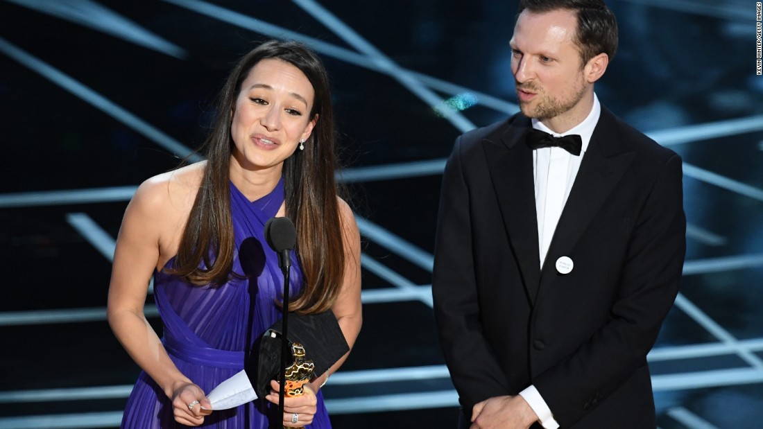 Producer Joanna Natasegara and director Orlando von Einsiedel accept the Oscar for best documentary (short subject). &quot;The White Helmets&quot; is about volunteer rescue workers in Syria.