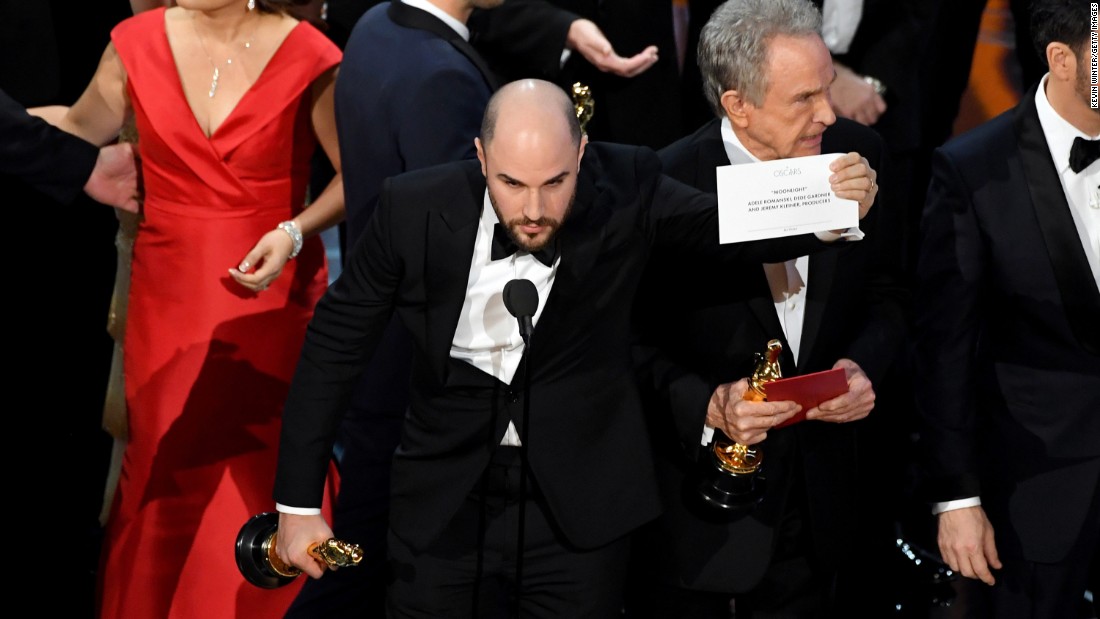 &quot;La La Land&quot; producer Jordan Horowitz holds up the winner card to the audience, proving that &quot;Moonlight&quot; had indeed won. Presenter Warren Beatty, seen behind Horowitz, told the crowd that he was given the wrong envelope.