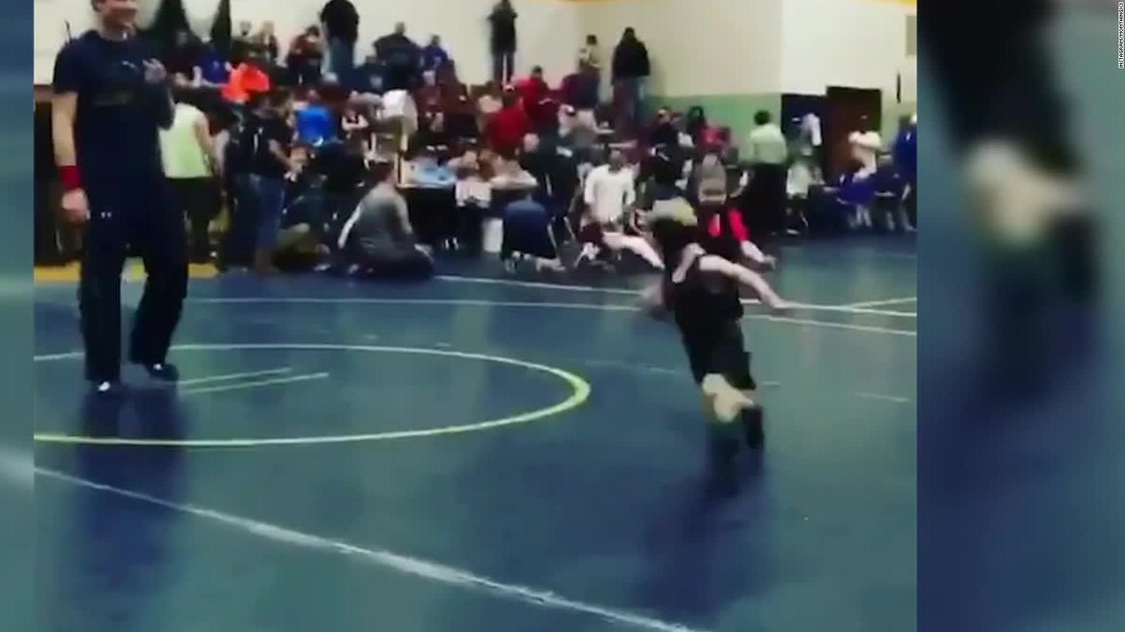 Kid runs in circles to avoid wrestling girl - CNN Video