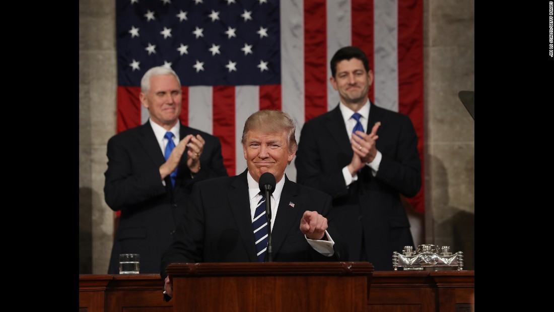 Trump is applauded after arriving in the House chamber.