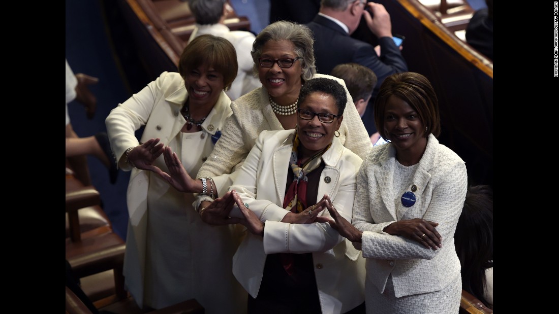 Many Democrats wore white as a nod to the women&#39;s suffrage movement. Posing for a photo here are, from left, US Reps. Brenda Lawrence, Joyce Beatty, Marcia Fudge and Val Demings.