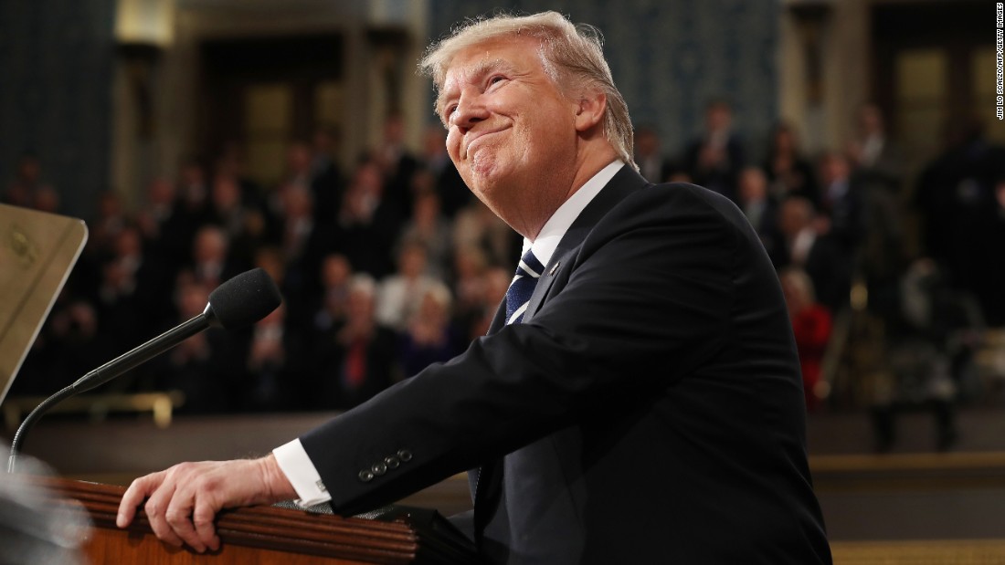 Trump smiles during his speech, which lasted over an hour.