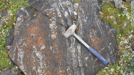 Orange-colored iron carbonite may once have been part of a hydrothermal vent miles underwater. 