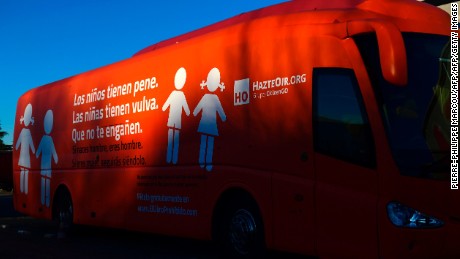 A picture taken on March 1, 2017 shows a big orange bus chartered by the HazteOir ("Make yourself heard") association reading "Boys have penises, girls have vaginas. Don't let them fool you. If you're born a man, you're a man, if you're a woman, you will continue to be so", parked in parking lot of the association near Coslada after being seized by Madrid authorities.


Prosecutors in Madrid on March 1, 2017 launched an "urgent" investigation into a conservative association that chartered a bus displaying a large, anti-transgender message to tour Spain, drawing widespread condemnation. The bus, which started circulating in Madrid on February 27, 2017 was part of the group's latest campaign against the promotion of gender identity, or the right for a person to feel like and be a man or a woman regardless of their birth sex. / AFP PHOTO / PIERRE-PHILIPPE MARCOU        (Photo credit should read PIERRE-PHILIPPE MARCOU/AFP/Getty Images)