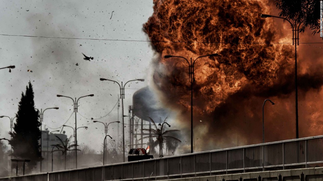 Flames billow from an explosion in Mosul during a clash between Iraqi forces and ISIS fighters on Sunday, March 5.