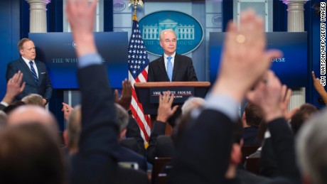 White House Press Secretary Sean Spicer (L) looks on as US Secretary of Health and Human Service Tom Price (C) takes questions during the daily briefing at the White House in Washington, DC on March 7, 2017. / AFP PHOTO / JIM WATSON        (Photo credit should read JIM WATSON/AFP/Getty Images)