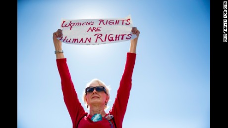 People take part in a march for International Women's Day in from Freedom Plaza to Lafayette Park near The White House in Washington, U.S. March 8, 2017. Photo by Eric Thayer