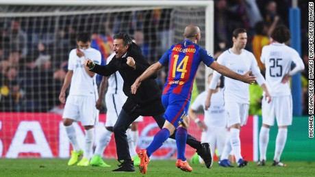 PSG players look dejected as Barca&#39;s coach Luis Enrique celebrates with Javier Mascherano.