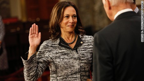 Sen. Kamala Harris participates in a reenacted swearing-in with U.S. Vice President Joe Biden in the Old Senate Chamber at the U.S. Capitol on January 3, 2017 in Washington, DC.